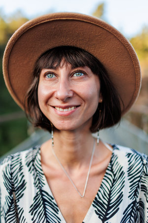 portrait of a girl in a hat on the street. young girl travels. girl in a hat.の写真素材
