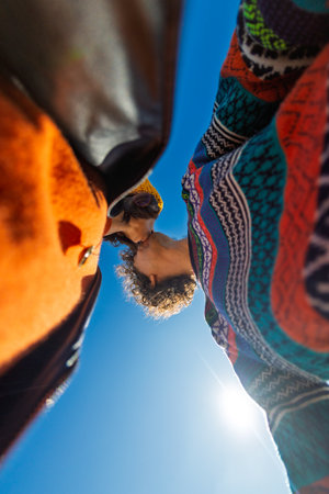 kiss on the street. Man and woman kiss. adult relationships outdoors. Emotions and feelings on vacation. Valentine's Day.の写真素材