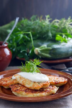 Fritters from zucchini, eggs, flour, salt, ricotta, selective focusの写真素材