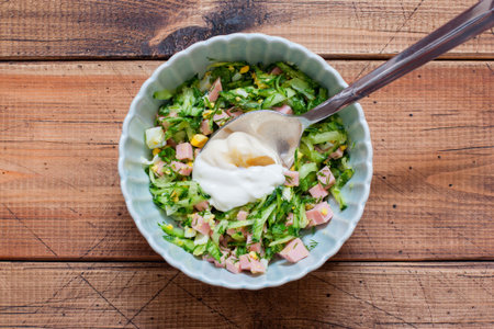 Step by step cooking traditional Russian cold okrosha soup, step 3 mixing ingredients, top view, horizontalの写真素材