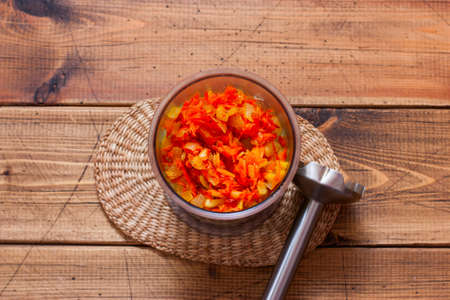 Cooking squash caviar step by step, step 4 - preparing fried vegetables for purの写真素材