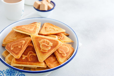Traditional Russian cookies, cooked on a plate in the form with prints, without baking in an...