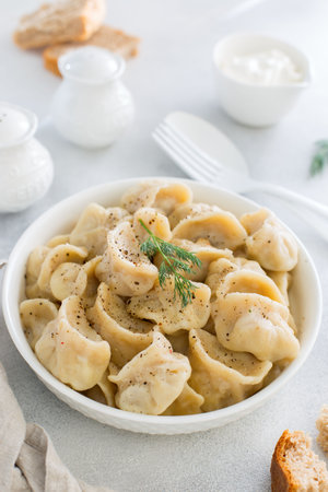 Handmade dumplings with meat, traditional Russian cuisine, selective focusの写真素材