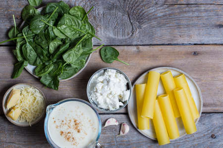 Ingredients for making cannelloni with spinach and ricottaの写真素材