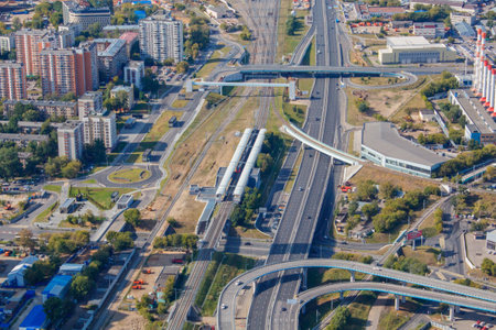 The view from the observation deck. Moscow Central Ring station. Top view of Moscow city. Summer in the city, sky and clouds. Sunny day. City roads.のeditorial素材
