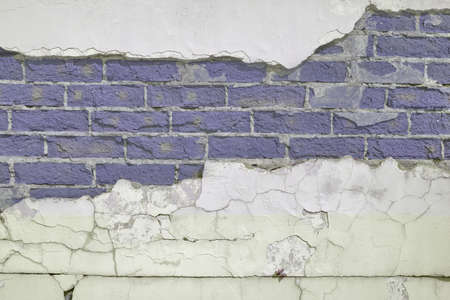 Blue brick texture with concrete frame, brickwork background with a broken cement surface, copy spaceの写真素材