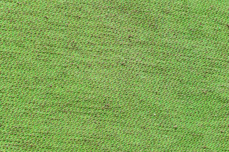 green coarse fabric  background.の写真素材