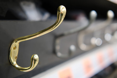 Sale of wall hooks hangers in the store, close-up