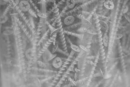 Black self-tapping plastic jar, close-up backgroundの写真素材