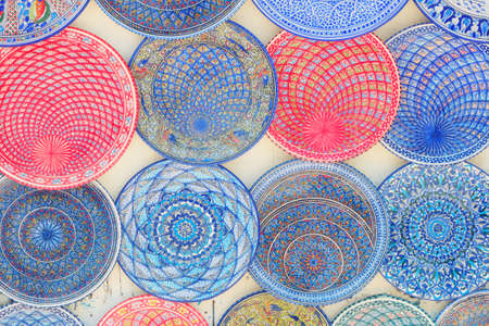 Arabic patterns on blue and red plates, backgroundの写真素材