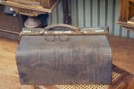 Retro bag and old round glasses, close-up