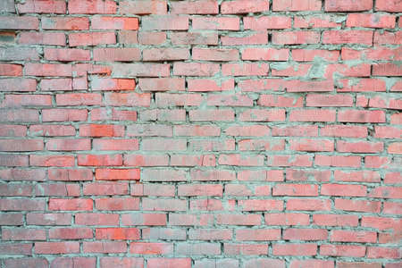 Background red brickwork in cement mortarの写真素材