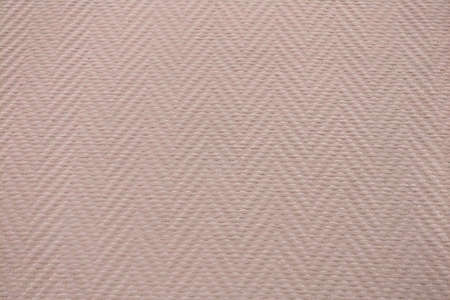 Beige paint background with diagonal lines, herringbone textureの写真素材
