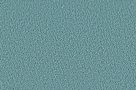 Background blue curly fabrics, close-up. Texture wool yarn made of randomly connected threads.