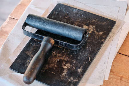 Roller for even distribution of ink during printing. Print books in the middle ages. Printing tools in the old days.の写真素材