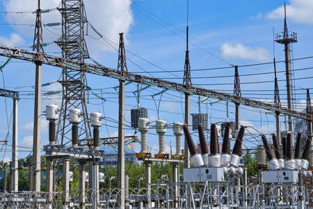Outdoor power plant, close-up. Electrical substation with power transformers and measuring elementsの写真素材