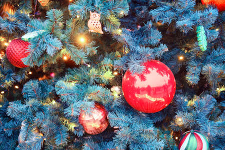 Branches of blue fir decorated with toys and balls before the new yearの写真素材