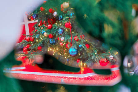 New year and Christmas tree decorations with mirror ice skateの写真素材