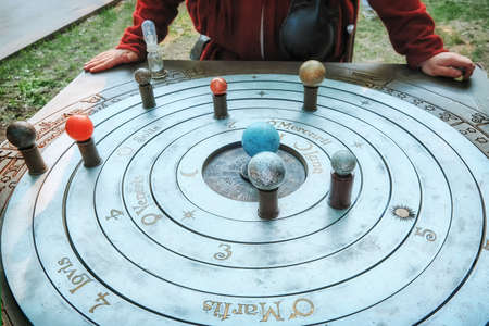 Model of geocentric solar system. The ancient idea of the rotation of the planets, the moon and the sun around the earth.の写真素材