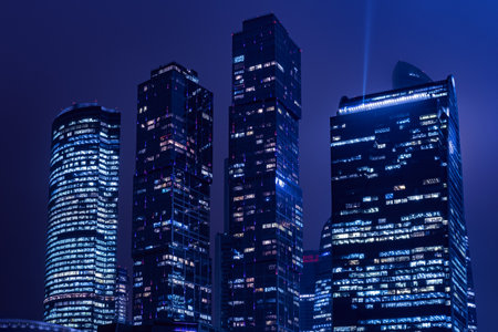 Towers of Moscow city - Empire, Capital, Federation on the embankment. Skyscrapers in night light Windows, high-rise buildings of the business center - Moscow, Russia, 12 13 2019のeditorial素材