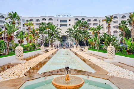 View of the hotel, Kantaoui Bay Iberostar Selection. Fountain in front of the hotel and the inscription Kantaoui Bay - Mideast, Tunisia, Sousse, Africa 06 14 2019のeditorial素材