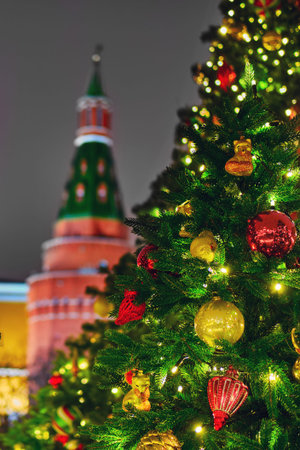 Christmas trees with toys on red square in night Russia, new year's celebration