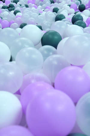 Background of purple and white balls in pastel colorsの写真素材