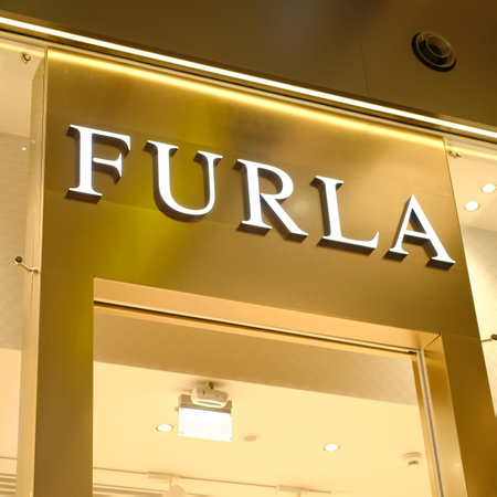 Logo Furla company above the store which sells bags and leather good - Moscow, Russia, December 17, 2020のeditorial素材