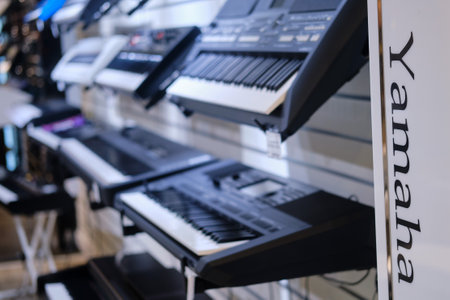 Black electronic piano Yamaha, synthesizers in musical store.のeditorial素材