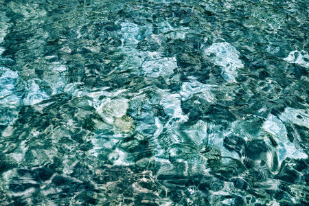 Transparent tropical ocean, coral reefs, abstract emerald water surface background. Water texture...