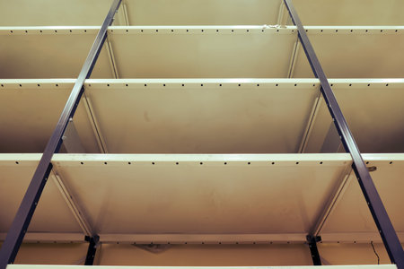 Empty racks without cargo on metal shelves, warehouseの写真素材