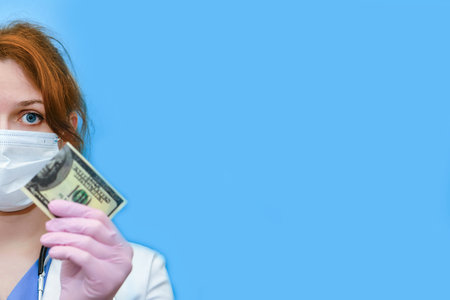 A blue uniform doctor is upset about money problems, blue background. A nurse in a medical hat and...