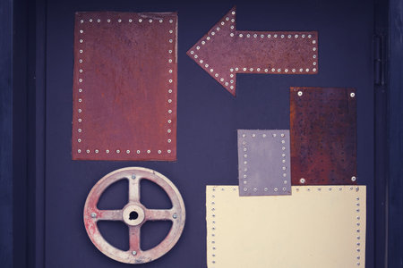 Retro metal door elements decorated with arrows and twistsの写真素材