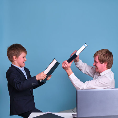 A fight in the family over problems with remote work and computer trainingの写真素材