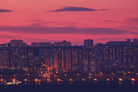 Red sky over buildings with Moscow city, Russiaの写真素材