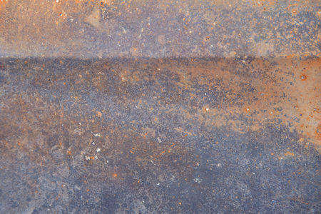 Burnt car door background, texture of rusty metal close upの写真素材