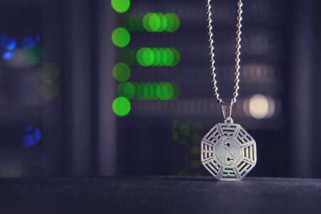 Buddhist symbol of yin and yang on the background of computer technology in the server roomの写真素材