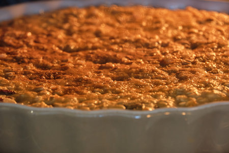 Oat pie in a large baking dish, close up