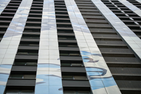 Windows on the facades of high-rise apartment buildings, close-up