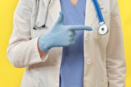 Medic finger shows the direction to go back home. Doctor in protective gloves and medical uniform,...