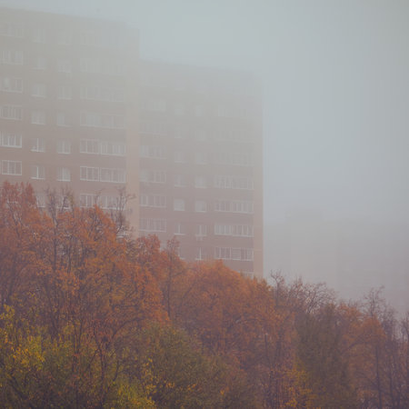 Windows on the facades of high-rise apartment buildings, fog close-upの写真素材
