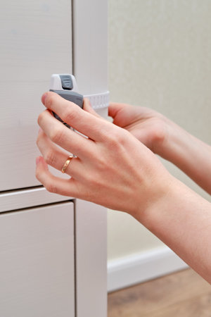 Danger for the baby to pinch the hand of the cabinet door or chest of drawers. Protect children from...