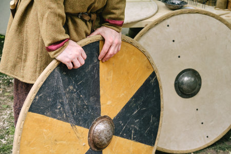 Making medieval shields made of wood and leather to protect soldiers in war. Reconstruction of the...