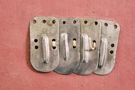Manufacture of medieval armor and chain mail to protect soldiers in battle. Reconstruction of the...