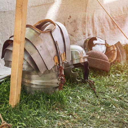 Ancient Roman weapons and armor - helmets and chain mail. Reconstruction of military events during the wars of the Roman Empireの写真素材