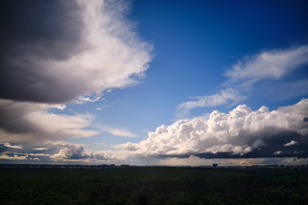 Dramatic sky with dark rain clouds on a hot summer day