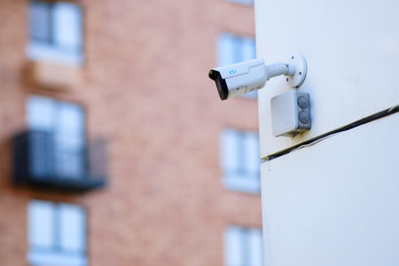 Surveillance camera rvi on the facade of the building. cctv camera at the entrance house - Moscow, Russia, August 12, 2022のeditorial素材