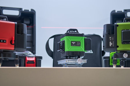 Measuring geodetic instrument for engineering works and topographic survey. Exhibition of professional tools for work, repair and construction Mitex - Moscow, Russia, November 09, 2022のeditorial素材