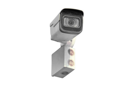 Video surveillance camera on the building, monitoring the security, isolated on a white background