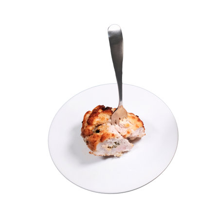 Cutlet with a fork, isolated on a white background. Plate with cutlet in Kiev, Ukraineの写真素材